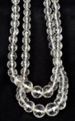 A double strand facet cut rock crystal bead necklace Mounted with a silver clasp.