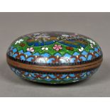 A small Japanese cloisonne box and cover Of domed form, decorated with birds amongst floral sprays.