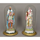 A pair of 19th century Continental bisque porcelain figures One male, one female,