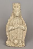 A stone carving of a monarch, possibly Medieval Modelled wearing a crown and a cape. 50 cm high.