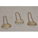 Three early 19th century silver decanter labels,