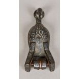 An African tribal carved wooden pulley Formed as a bird. 22 cm high.