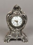 An unmarked silver cased Tiffany desk clock The case of scrolling rococo form,
