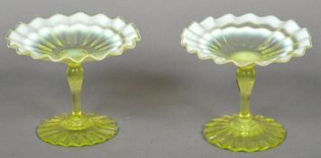 A pair of Uranium and Vaseline glass tazza Each with wavy rim. 12.5 cm high.