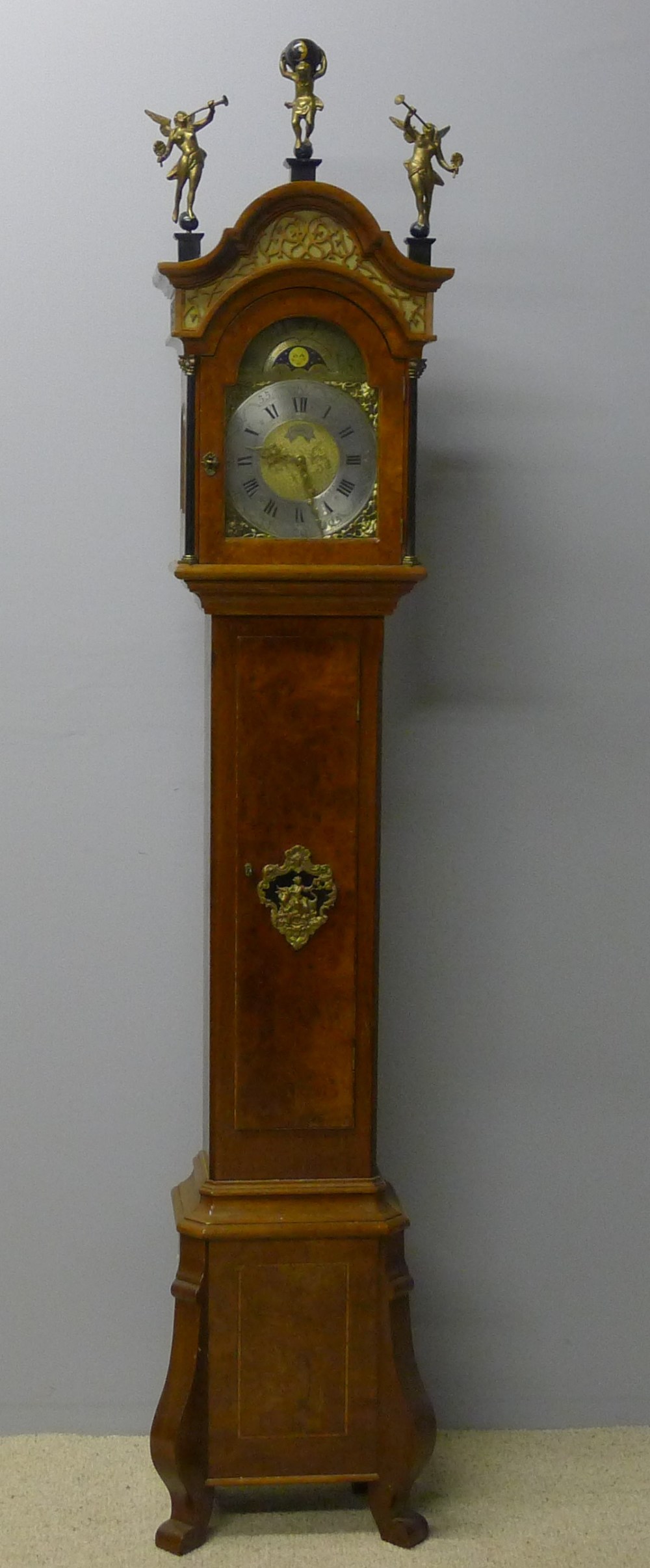 A small Dutch burr walnut cased longcase clock The brass dial with silvered chapter ring with Roman