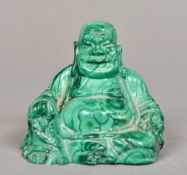 A Chinese carved malachite Buddha Modelled seated. 6 cm high.