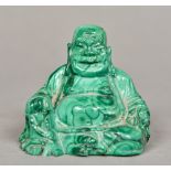 A Chinese carved malachite Buddha Modelled seated. 6 cm high.
