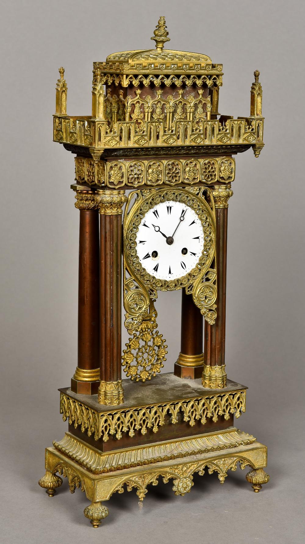 A 19th century Empire style ormolu mounted portico clock,