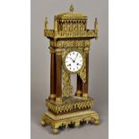 A 19th century Empire style ormolu mounted portico clock,