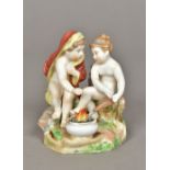 A Continental porcelain group Modelled as two scantily clad children warming themselves by and