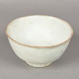 A Chinese porcelain bowl With allover robins egg blue glaze, standing on a shallow foot. 14.
