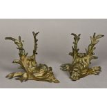 A pair of late 19th century bronze wall lights Worked with mythical dolphin masks and aquatic