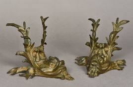 A pair of late 19th century bronze wall lights Worked with mythical dolphin masks and aquatic