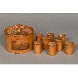 A 19th century mauchline ware spice box Of castellated circular form decorated with views of