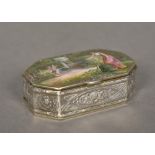 A Continental silver enamel decorated box Of canted rectangular form,