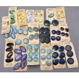 A quantity of genuine Ruskin Staffordshire porcelain buttons Variously glazed, some mounted on card,