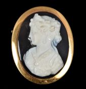 An antique gold mounted carved hardstone cameo pendant brooch Centrally carved with a classical