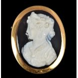 An antique gold mounted carved hardstone cameo pendant brooch Centrally carved with a classical