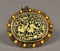 A 19th century Indian unmarked gold pendant brooch Of oval form,