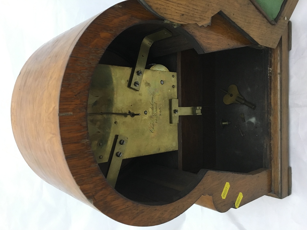 A Victorian oak cased bracket clock The white dial with Roman numerals inscribed Arnold 8? Strand, - Bild 10 aus 13