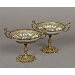 A pair of gilt metal mounted Canton porcelain tazza Each typically decorated,