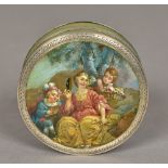 An 18th century painted tortoiseshell patch box The circular unmarked silver banded removable lid