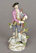 A 19th century Meissen porcelain figure of a bagpiper Modelled before a tree stump with a dog and a