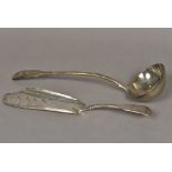 An early 19th century silver soup ladle, hallmarked London 1827,