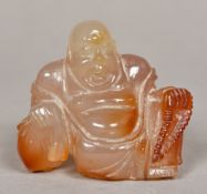 A Chinese carved agate Buddha Worked seated. 7 cm high.