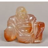 A Chinese carved agate Buddha Worked seated. 7 cm high.