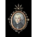 A 19th century miniature portrait, possibly Mozart Mounted in a diamond set pendant frame.
