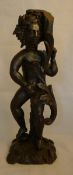 A 17th century carved oak figure,