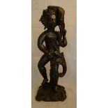 A 17th century carved oak figure,