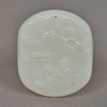 A Chinese carved jade pendant Worked with a sage reclining in a river landscape opposing archaistic