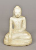 A carved white marble figure of Buddha Typically modelled, seated in the lotus position.