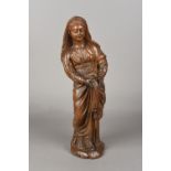 An 18th/19th century Continental carved wood figure, possibly the Virgin Mary 46 cm high.