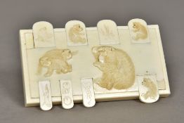 A 19th century Japanese carved ivory whi