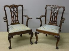 A pair of 19th century mahogany open arm