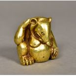 A Chinese cast gilt bronze mythical beas
