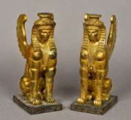 A pair of carved wooden gilt decorated c