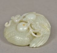 A Chinese carved white jade group Worke