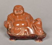 A Chinese carved hardstone Buddha