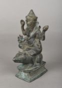 An antique Indian cast bronze figure of