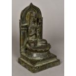 A Chinese cast bronze figure of Buddha
