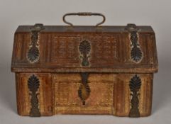 A tooled leather casket The hinged lid