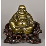A Chinese cast bronze Buddha Modelled