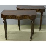 A pair of mahogany console tables Each