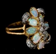 A 14 K gold, opal and diamond cluster ri