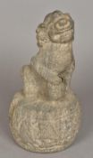 An antique Chinese stone carving of dog-