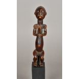 An African tribal carved wooden figure